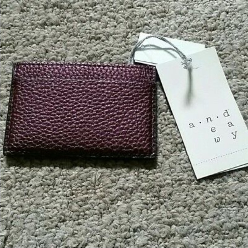 A New Day boysenberry metallic card holder wallet.